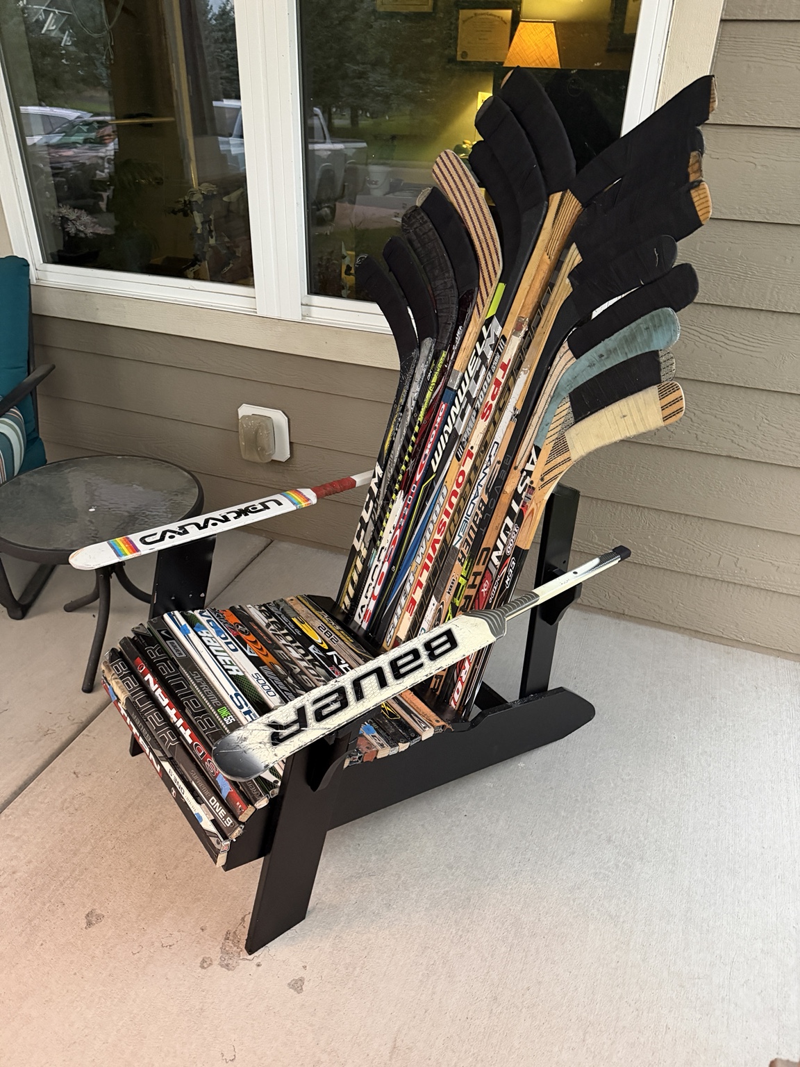 Hockey stick Adirondack chair on a porch
